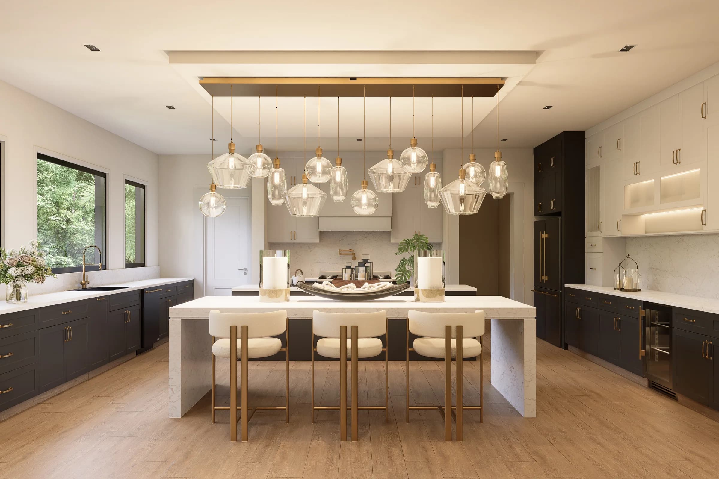 Main kitchen with dark custom cabinetry and a marble waterfall island