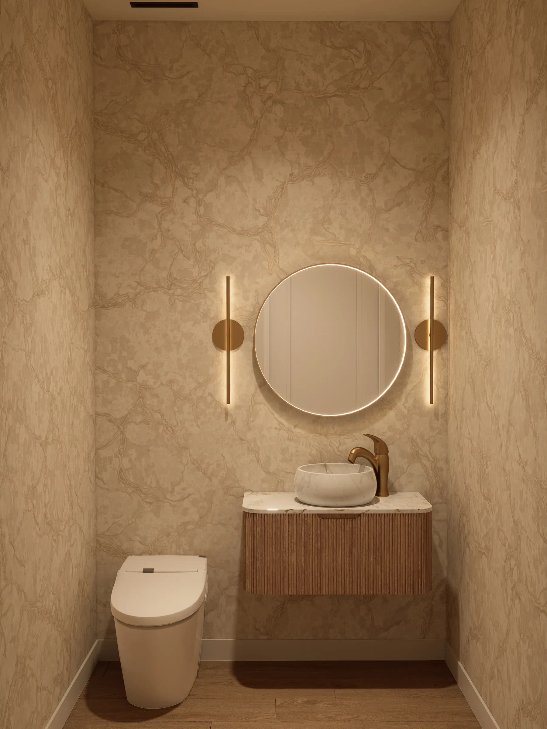 Powder room with statement stone and brass fixtures